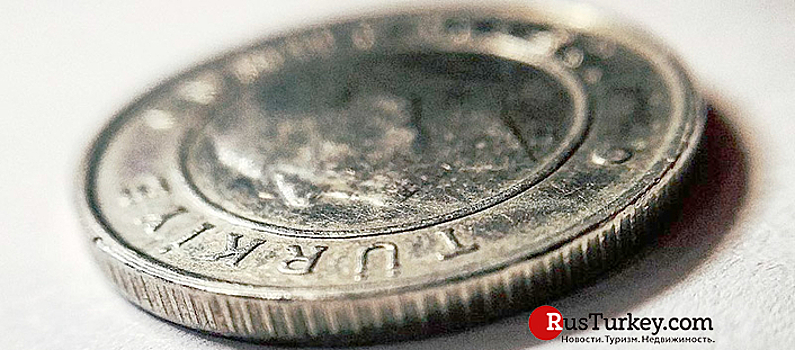Турецкая лира снизилась до 18,38 за доллар США
