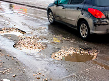 Верховный суд разъяснил, кто должен платить за повреждения из-за ямы на дороге