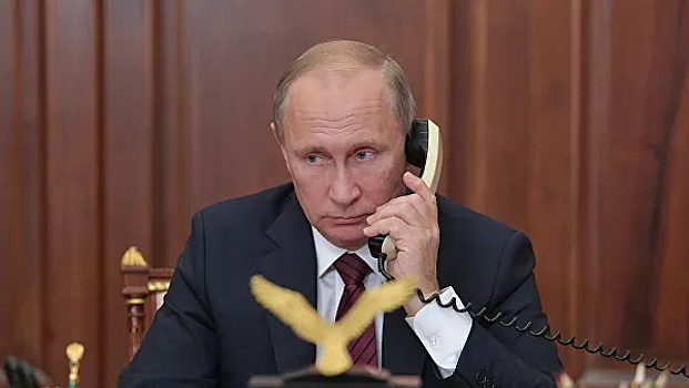 Путин и Меркель провели телефонный разговор