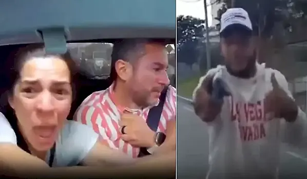 Видеокамера сняла момент вооружённого налёта на пару, сидящую в автомобиле
