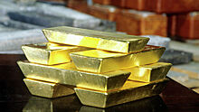 Золото ускорило падение до 5% на рисковых настроениях