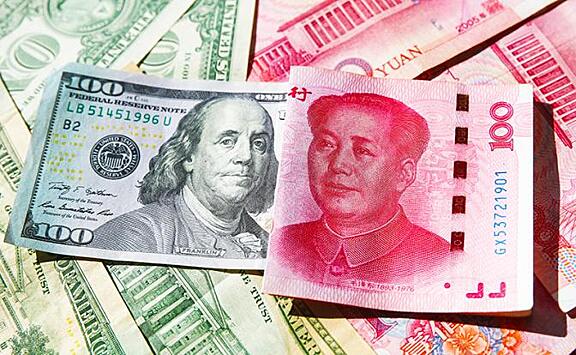 Юань пошел вниз по отношению к доллару