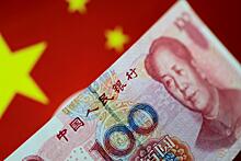 Китай девальвирует юань назло США