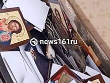 В России сотни выброшенных на помойку около храма икон сняли на видео