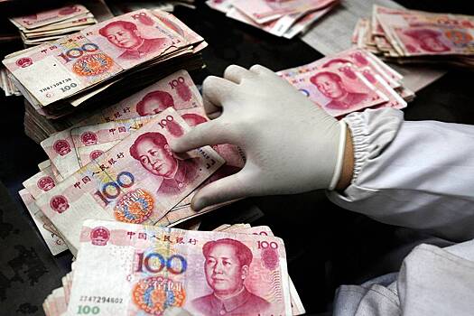 Экономист назвал предел снижения курса юаня