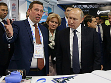Путин осмотрел выставку "Современный спорт. Инновации и перспективы"