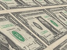 Банк России повысил официальные курсы доллара и евро на вторник