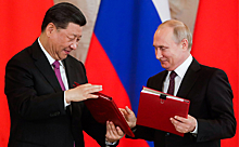 Путин поздравил Си Цзиньпина с переизбранием председателем КНР