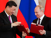 Путин поздравил Си Цзиньпина с переизбранием председателем КНР