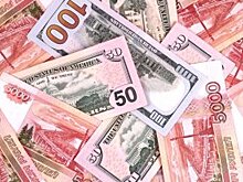Аналитики прогнозируют летний рост спроса на валюту