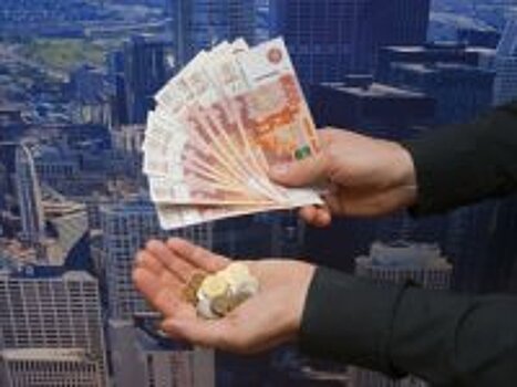 За что работники убыточного госбанка получают огромные премии?