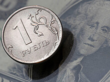Рубль растёт к доллару и евро