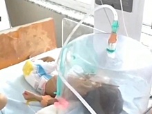 Чудо на индийском кладбище: младенец провел под землей трое суток