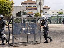 Протестующие подожгли здание парламента Непала