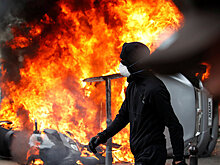Акт Магнитского в Лондоне под первомайские беспорядки в Париже
