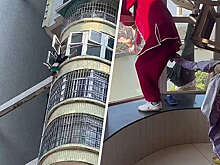 В Китае спасли 85-летнего мужчину, свисавшего из окна многоэтажки