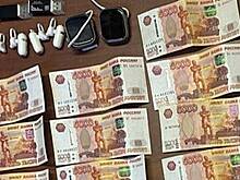 Мужчина хотел пронести в СИЗО в Подмосковье смарт-часы и 200 тысяч рублей