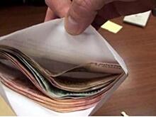 Саратовского пенсионера подозревают в даче взятки сотруднику ФСБ