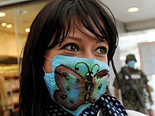 Роспотребнадзор предложил сделать ношение медицинских масок обязательным