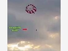 Мужчина упал в море с 60 метров во время полета на парашюте и попал на видео