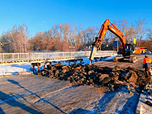 Профессионалы начали демонтаж дорожного полотна в Кемерове