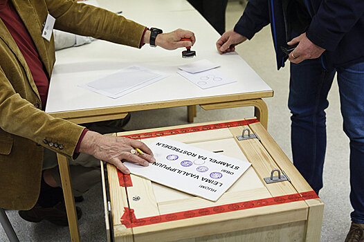 Финский избиратель пришел на выборы с фотографией Путина