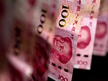 Китай перевел больше половины внешнеторговых расчётов в юани