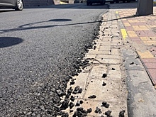 В Курске дорожники положили асфальт поверх тротуарной плитки