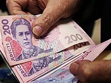 Курс гривны упал до уровня 27,23 за доллар