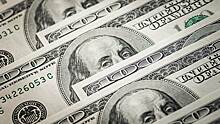 Доллар дешевеет на неопределенности политики США