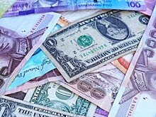 ЦБ повысил официальные курсы доллара и евро на 25 октября