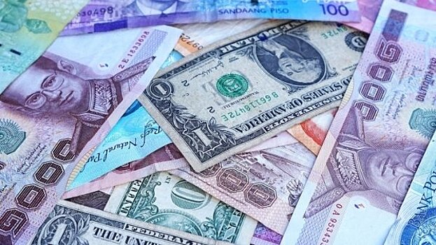 ЦБ повысил официальные курсы доллара и евро на 25 октября