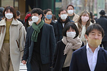 Премьер Японии поручил рассмотреть возможность приравнять COVID-19 к сезонному гриппу