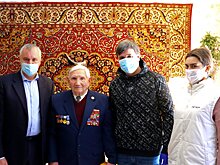 Подмосковные молодогвардейцы в честь Дня защитника Отечества поздравили ветеранов и подготовили фотовыставки