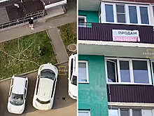 Видео: россиянин заряжает электрокар из окна 20 этажа