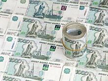 Глава ВТБ считает рубль недооцененным