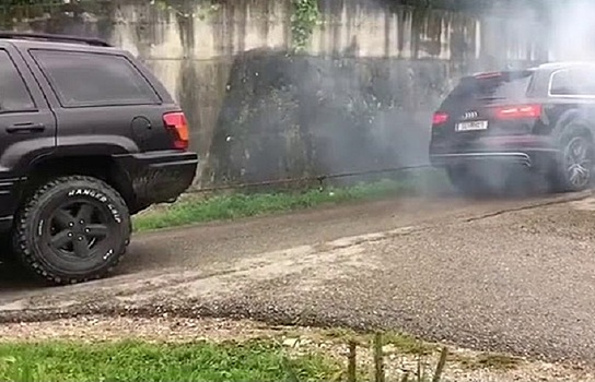 Битва мускулов - старый Jeep Grand Cherokee против Audi SQ7