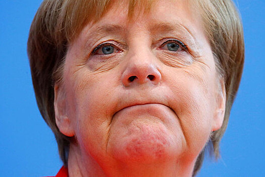 Меркель заявила, что санкции с России снимать рано