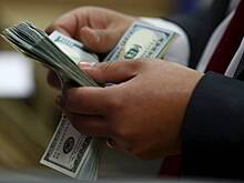 В сделавшей золото валютой стране собрались отказаться от доллара