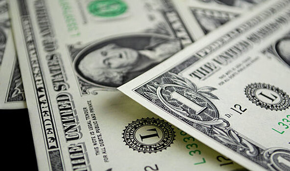 Средневзвешенный курс доллара вырос до 49,86 рубля
