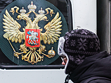 Путин подписал закон о крестах на гербе России