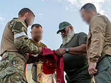 В Курской области росгвардейцам передали знамя и икону Георгия Победоносца
