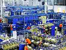 Роботы помогают «Почте России» работать с посылками