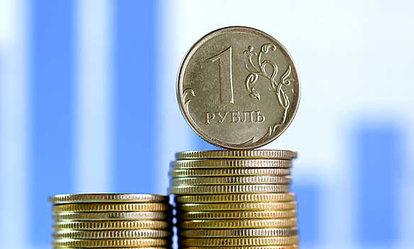 Рубль укрепился к доллару и евро после решения ЦБ по ставке