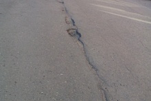 Дорогу-долгострой в Ворошиловском районе Волгограда затянуло ямами