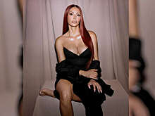 Бизнесвумен Ким Кардашьян перекрасилась в красный для рекламы помады