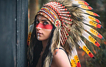 Зачем индейцы носят на голове перья