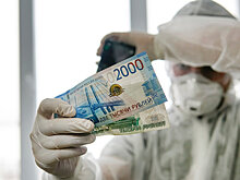 Как новый штамм коронавируса "омикрон" скажется на движении рубля