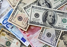 Средневзвешенный курс доллара на 11:30 мск повысился до 61,94 рубля