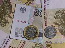 Официальный курс доллара вырос на 84 копейки, евро — на 63